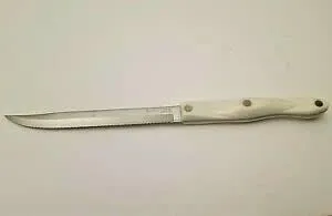 Model 1729 CUTCO Petite Carvers. 6.75” Double-D serrated edge blades and 5.5” white (pearl) handles.